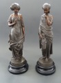 Two figures, metal alloy, h 42.5 cm