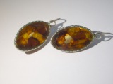Amber earrings in metal frame