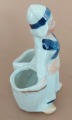 Salt shaker woman with baskets