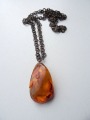 Amber pendant on the chain