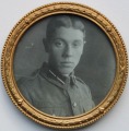 Latvian officer. Photo in the brass frame d 7 cm