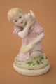 Girl with a dove, porcelain h 12 cm