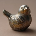 Metal salt shaker bird