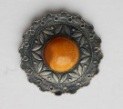 Silver brooch with amber d 6 cm