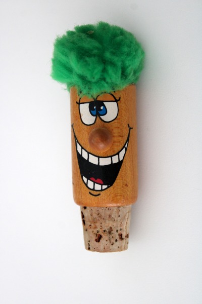 A cork man with green hair