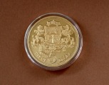 Позолоченная медаль – копия монеты номиналом 5 лат 1931 года.