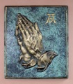 A. Dīrers. Rokas. Bronza, 17.5x15.5 cm