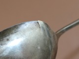 Sudraba karote ar defektu, 830 prove, garums 21 cm; svars 38.29 g.