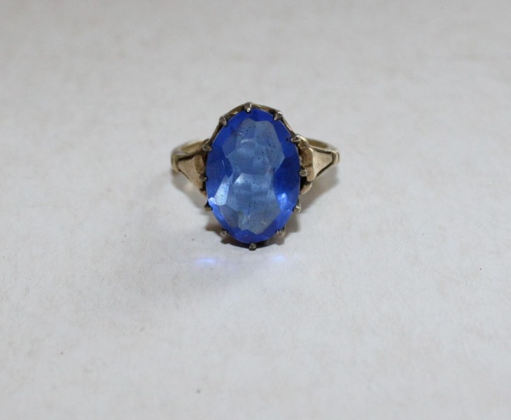 Ring with blue stone