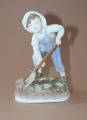 Boy in the garden, England, porcelain, h 16.5 cm