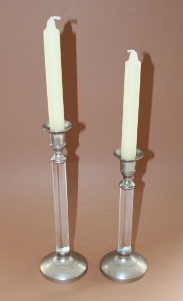 Pair of candlesticks with candles h 26.5 cm; h 22 cm