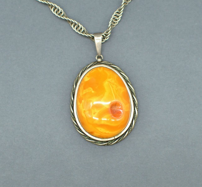 Natural amber brooch