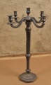 Silver-plated metal candlestick. Height 63 cm