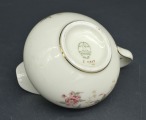 Porcelain ivory cream jug. Europe. Decoll. 8x14x10 cm