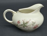 Porcelain ivory cream jug. Europe. Decoll. 8x14x10 cm