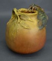 Majolica with cricket and apples.