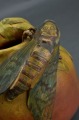 Majolica with cricket and apples.