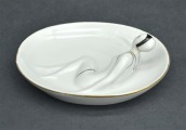 Porcelāna dārglietu trauks ar peldētāju. Kuzņecovs, Latvija. 11,5x9,5 cm