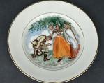 Painted plate with a folk motif. H. Krisone. 15.5 cm
