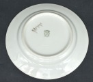 Painted plate with a folk motif. H. Krisone. 15.5 cm