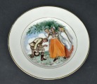 Painted plate with a folk motif. H. Krisone. 15.5 cm