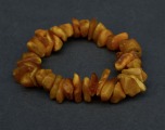 Amber bracelet on rubber, yellow