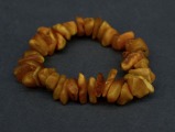 Amber bracelet on rubber, yellow