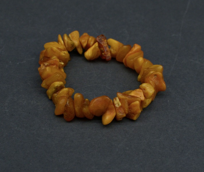 Amber bracelet on rubber, yellow