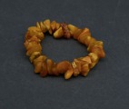 Amber bracelet on rubber, yellow