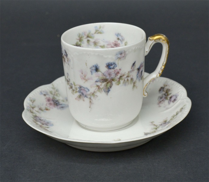 Limoges and Bavaria cup and saucer. 6 cm and 11 cm