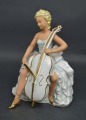 Porcelain figurine Cellist. Wahlendorf, Germany. H 23 cm.