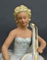 Porcelain figurine Cellist. Wahlendorf, Germany. H 23 cm.