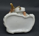 Porcelain figurine Cellist. Wahlendorf, Germany. H 23 cm.
