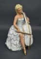 Porcelain figurine Cellist. Wahlendorf, Germany. H 23 cm.