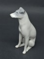 Porcelain figure Dog. Early 20th century. 10 cm