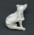 Porcelain figure Dog. Early 20th century. 10 cm