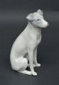 Porcelain figure Dog. Early 20th century. 10 cm