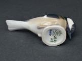 Porcelain bird, gray. 5.5 cm