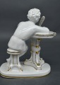 Porcelain Writing young man. 1950s. H14 cm. Restored feather.