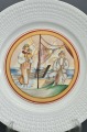 Porcelāna šķīvis pēc Romana Sutas meta