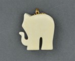 Кулон из кости с золотой отделкой и искусственными камнями. 2,8x2,4x0,5 cм