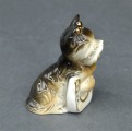 Porcelāna figūriņa Suņuks ar pakavu. 7 cm