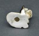 Porcelāna figūriņa Suņuks ar pakavu. 7 cm