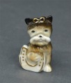 Porcelāna figūriņa Suņuks ar pakavu. 7 cm