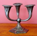 Candlestick in the form of lilies