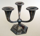 Candlestick in the form of lilies