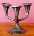 Candlestick in the form of lilies