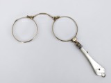 Lorgnette. 14k gold. Mother-of-pearl handle, gold-plated. 4.5x12 cm