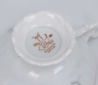 M.S. Kuzņecova rūpnīca, Rīga (Latvija) tējas tase ar apakštasi. Por., dekols. d 10,5 cm un 15 cm