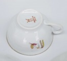 M.S. Kuzņecova rūpnīca, Rīga (Latvija) tējas trio. Porcelāns, dekols. d 9,8 cm, 15,2 cm un 18 cm